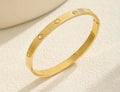 Bracelet - Golden Heart Signature Slim Bangle