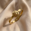 Zyverra Medallion Clasp Bangle